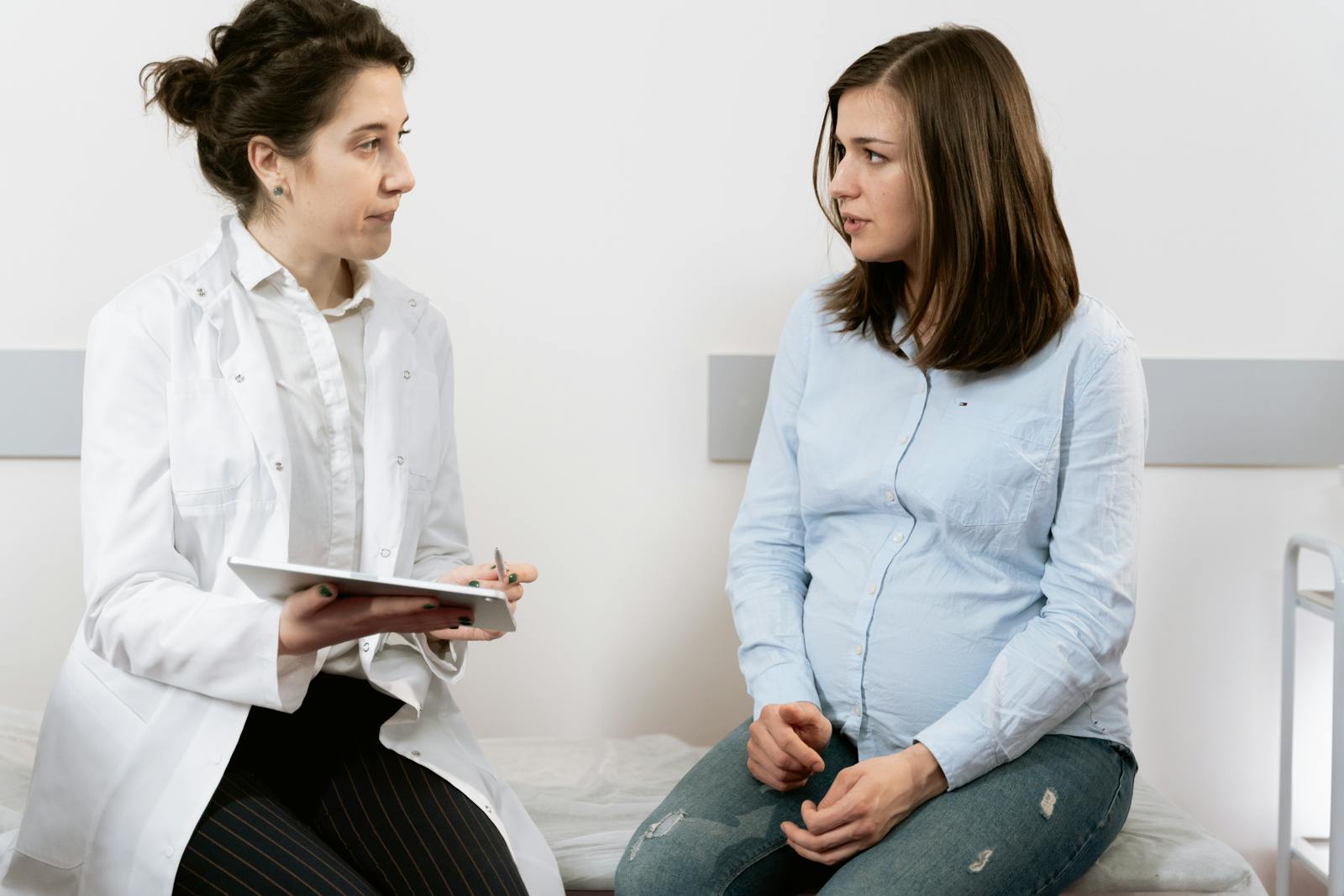 Doctor consulting with patient